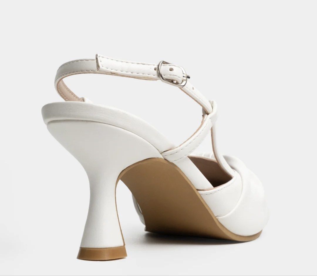 White Pointed Toe Slingback Heels with Bow Detail (Category: Heels) located in Antipolo. Submitted by chi._.declutters (Listing ID 1468241426, Image 3). Description: loc: marikina / lower antipolo area marikina-made, matibay available: size 8 and 10 +100 for tranpo if meetup.