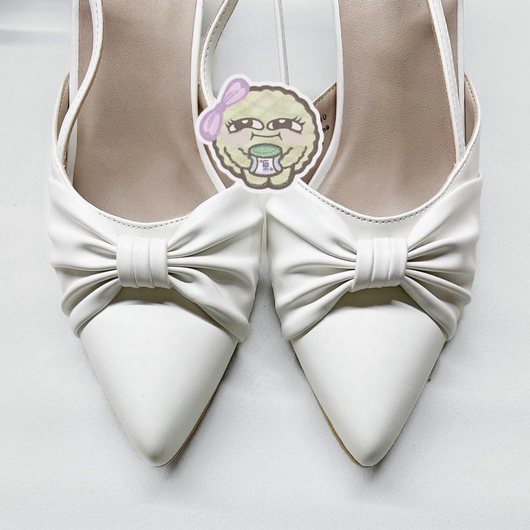 White Pointed Toe Slingback Heels with Bow Detail (Category: Heels) located in Antipolo. Submitted by chi._.declutters (Listing ID 1468241426, Image 2). Description: loc: marikina / lower antipolo area marikina-made, matibay available: size 8 and 10 +100 for tranpo if meetup.