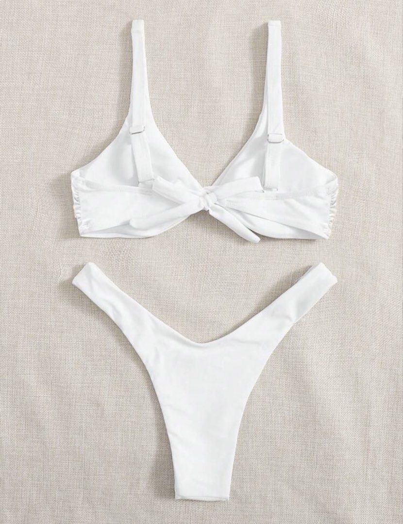 White Twist Front Bikini Set Two Piece Swimwear (Category: Bikinis & Swimsuits) located in Taguig. Submitted by anne_di0909 (Listing ID 1468134690, Image 2). Description: - Small on tag but can fit to medium body frame Reference: 34B 28 waistline RFS: not too fit Recently purchased/Never been used Original price: 438 Selling price: 350 PTP: got the worn photos from reviews ✨Reminders:✨ — MOP: GCash only — Courier within MM: Lalamove, Grab (same d