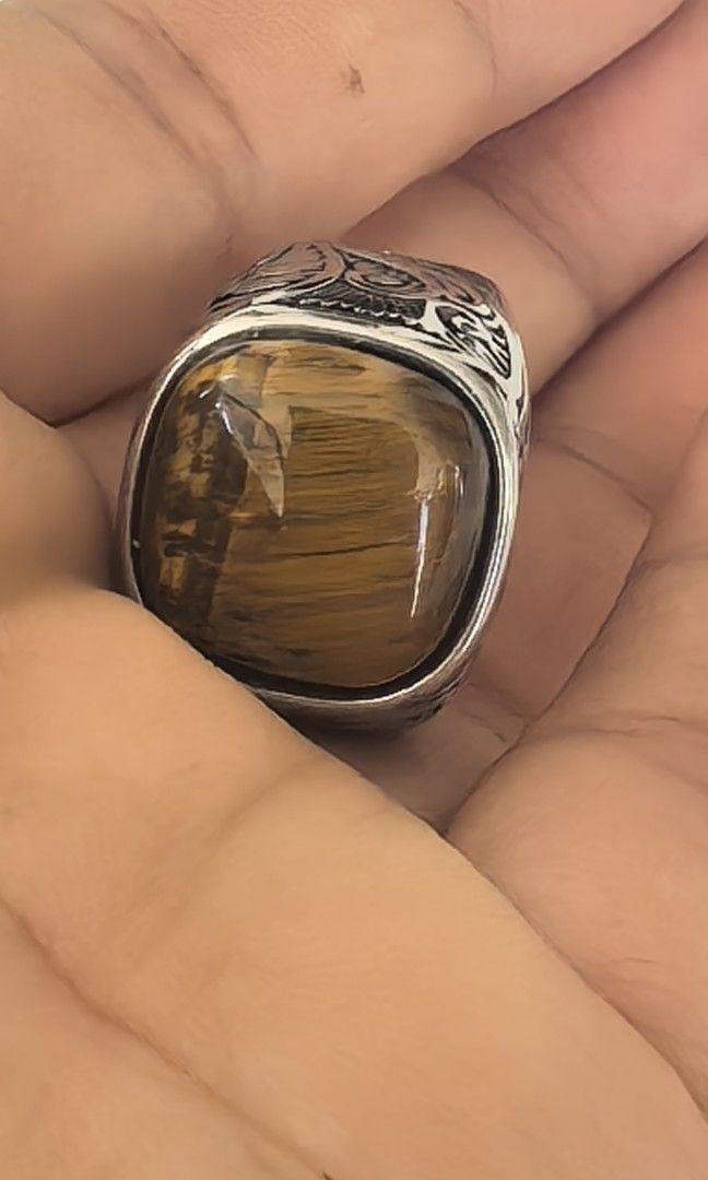 Women tigers eye ring (Category: Rings) located in Tuguegarao City. Submitted by zenphoenix-7ad615 (Listing ID 1468076518, Image 1). Description: Tigers eye ring Size 6.5 more. Or less kasya sa akin Na size 7.