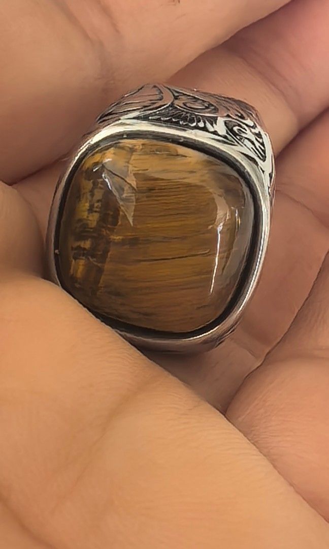 Women tigers eye ring (Category: Rings) located in Tuguegarao City. Submitted by zenphoenix-7ad615 (Listing ID 1468076518, Image 2). Description: Tigers eye ring Size 6.5 more. Or less kasya sa akin Na size 7.