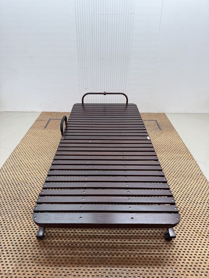 Wooden folding bed (Category: Bed Frames & Mattresses) located in Quezon City. Submitted by matetdevis13 (Listing ID 1468228302, Image 2). Description: Wooden Single Folding Bed Price: 4,900 36 x 78.5 x 11.5 In good condition Code JMD18-M239.