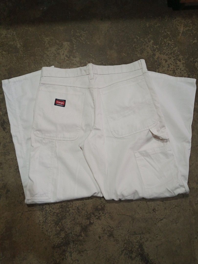 Wrangler Workwear White Carpenter Pants (Category: Jeans) located in Cabuyao City. Submitted by kenzu_stuff (Listing ID 1468090432, Image 2). Description: Wrangler Workwear White Carpenter Pants Semi-Big Pocket - Size: 32x30 on tag - Length: 40" - Thigh: 13" - Hem/LO: 8.5" - Issue: NONE - Condition: EXCELLENT, CRISPY - Color Rate: 10/10 WHITE - Color may vary due to lighting. - Thrifted item(s), please manage your expectations. We do shipping nat