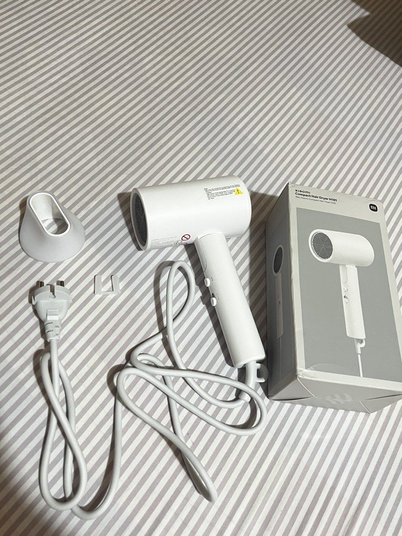 Xiaomi Compact Hair Dryer (Category: Hair) located in Binan City. Submitted by med.ph7 (Listing ID 1468163821, Image 1). Description: ✨ FOR SALE: Xiaomi Compact Hair Dryer ✔️ Foldable & lightweight — perfect for travel and easy storage ✔️ High-speed airflow (15 m/s) ✔️ Negative ion technology to help reduce frizz and enhance hair shine ✔️ 2 temperature modes: Hot & Cold ✔️ 2 speed modes ✔️ 1600W power ✔️ Built-in overheat protection ✔️ Comes with
