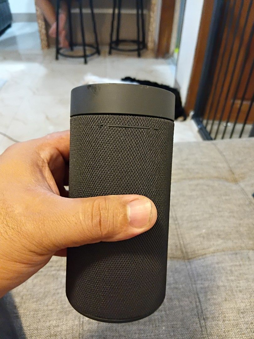 Xiaomi Mi Bluetooth Speaker Portable Black (Category: Soundbars, Speakers & Amplifiers) located in Makati City. Submitted by boybenta21 (Listing ID 1468241002, Image 2). Description: - Brand: Xiaomi Portable Bluetooth Speaker - Color: Sleek black with a bright orange carrying cord and Mi logo tag - Design: Compact, cylindrical mesh body with easy-access side volume buttons and durable rubber top/bottom caps - Portability: Lightweight and easy to 