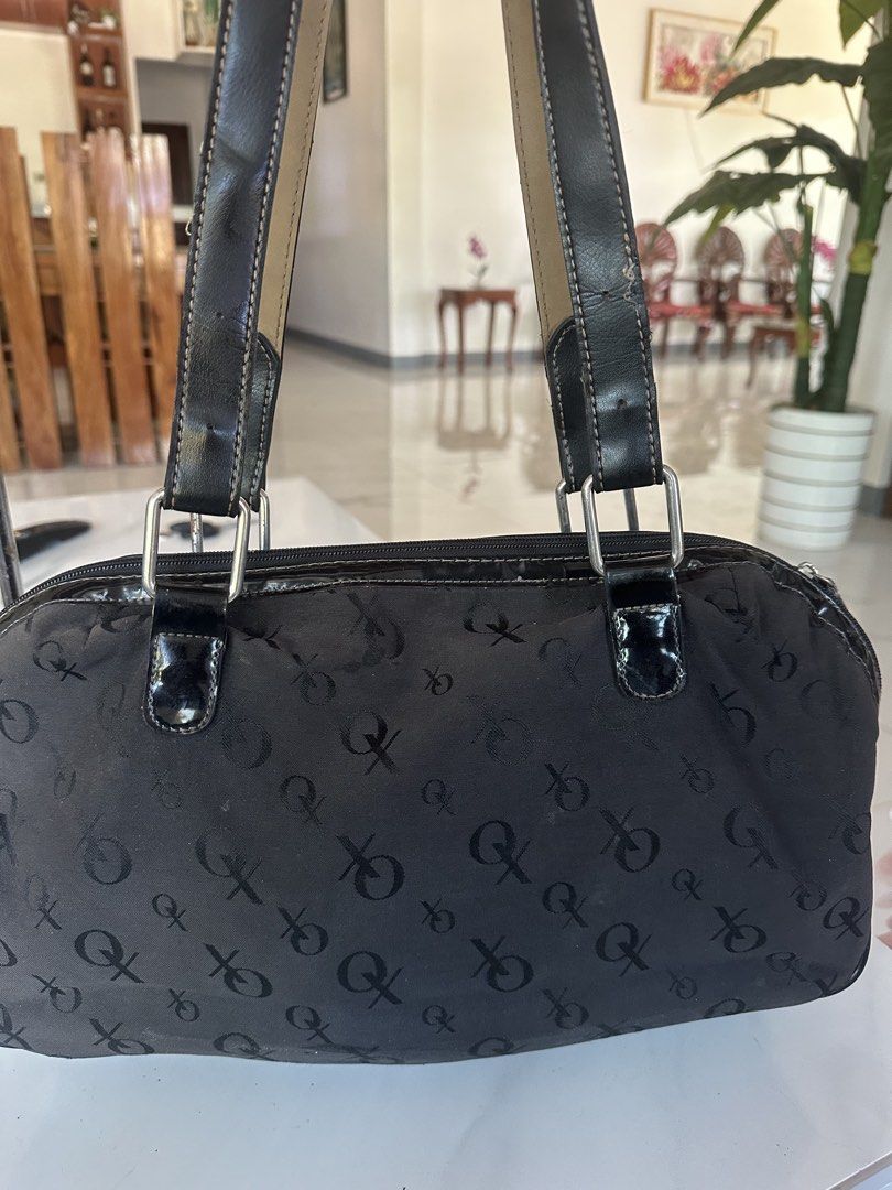 XOXO Black Monogram Shoulder Bag (Category: Shoulder Bags) located in Manila. Submitted by goldenhorse-dafc (Listing ID 1468094405, Image 3). Description: - Brand: XOXO - Color: Black with all-over monogram print - Details: Patent leather trim, silver-tone hardware, and a dangling heart charm on a ring pull - Closure: Secure top zip closure - Interior: Printed fabric lining - Condition: Brand new / Excellent (ready to ship) - Mode of Payment: GCa