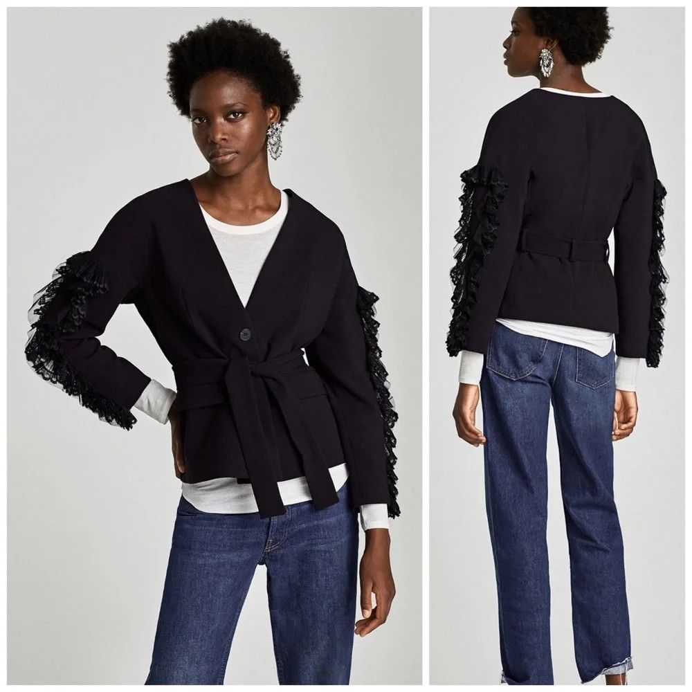 Xs Zara Blazer with Ruffle Sleeve (Category: Others Tops) located in Castillejos. Submitted by lalainecloset22 (Listing ID 1468183732, Image 1). Description: - Brand: Zara Basic Collection - Issue: Missing Belt Only - Size: XS (EUR/USA XS, MEX 24) - Color: Classic Black - Design: Open front/single-button style with stunning lace and tulle ruffle detailing on sleeves - Condition: Well-maintained and pre-loved.