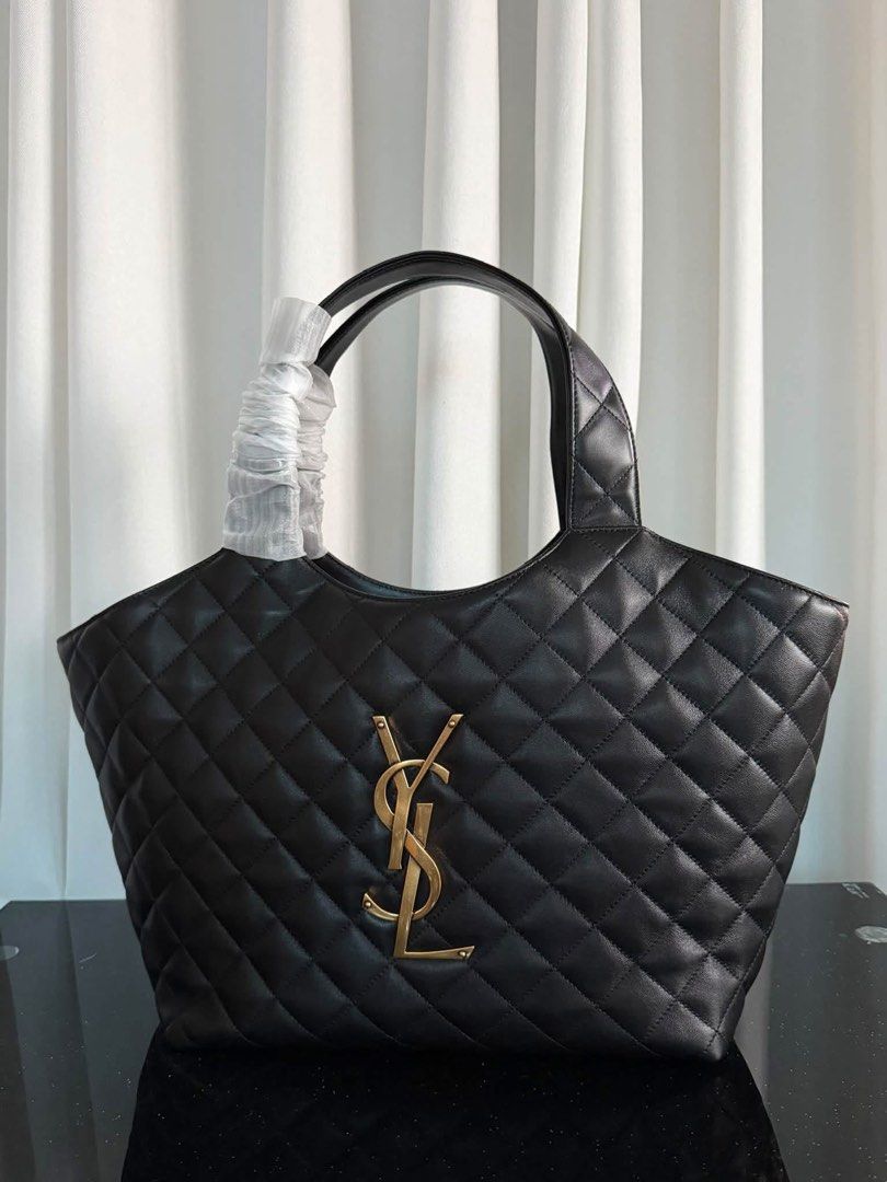 Ysl Maxi Shopping Bag (Category: Luxury Bags & Wallets) located in Manila. Submitted by bagsandmanymanymore1 (Listing ID 1468073498, Image 1). Description: YSL Maxi Shopping Size 48cm(L) x 30cm(H) x 5cm(W) Lambskin leather Can be worn wide or with closes sides Detachable metal chain toggle closure Interior-one removable zipper pouch Grossgrain lining.