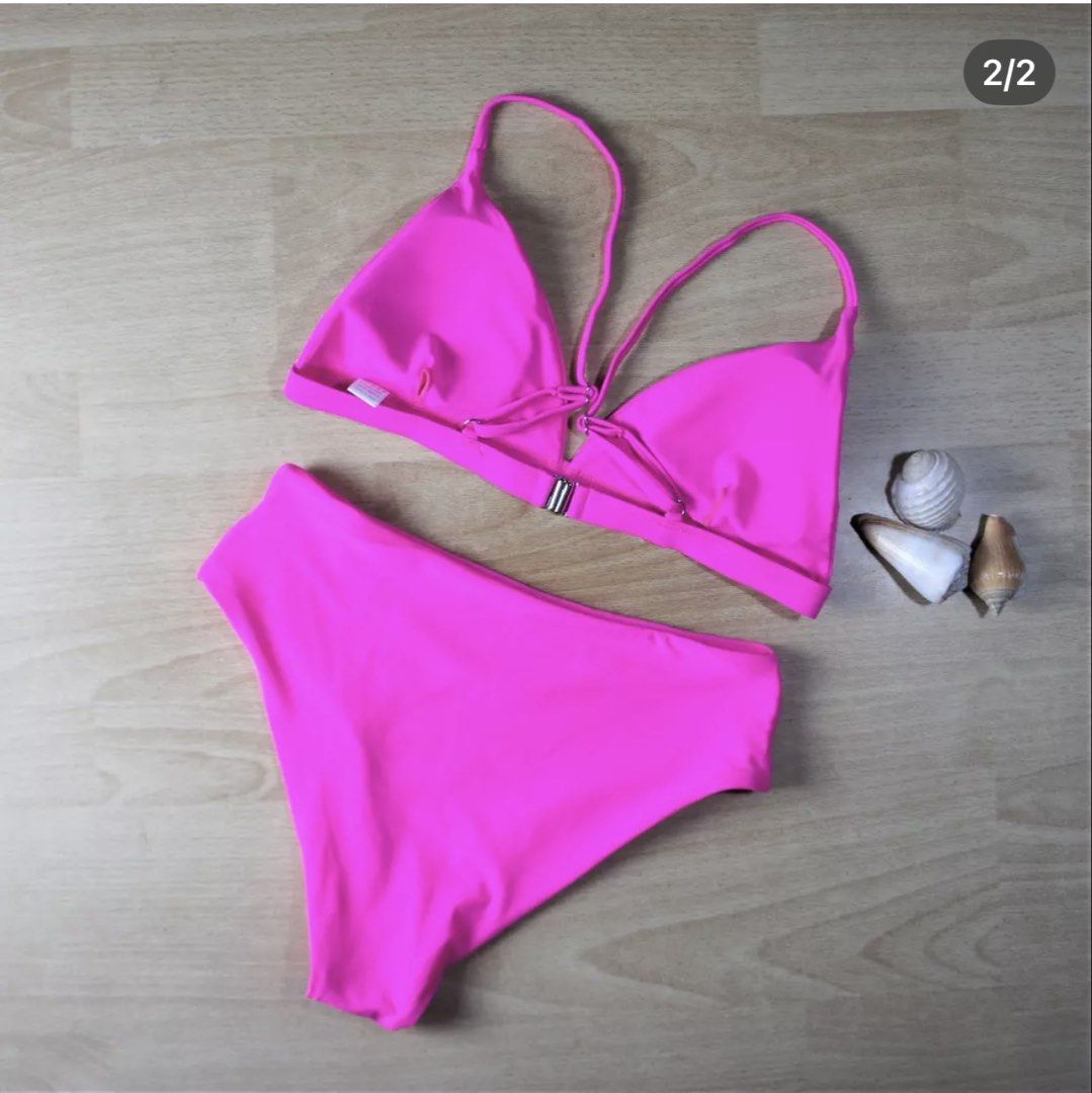 Zaful Neon Pink High Waisted Bikini (Category: Bikinis & Swimsuits) located in Bulacan. Submitted by peach1025 (Listing ID 1468068526, Image 2). Description: - Brand: Zaful - Style: Two-piece bikini set with high-waisted bottoms and triangle top - Color: Bright pink - Size: Medium (tag attached) - Condition: Brand new with original hangtag, never worn - Details: Adjustable gold-tone metal hardware on the back straps.