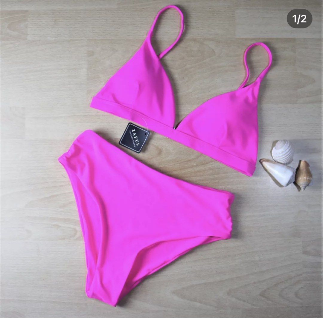 Zaful Neon Pink High Waisted Bikini (Category: Bikinis & Swimsuits) located in Bulacan. Submitted by peach1025 (Listing ID 1468068526, Image 1). Description: - Brand: Zaful - Style: Two-piece bikini set with high-waisted bottoms and triangle top - Color: Bright pink - Size: Medium (tag attached) - Condition: Brand new with original hangtag, never worn - Details: Adjustable gold-tone metal hardware on the back straps.