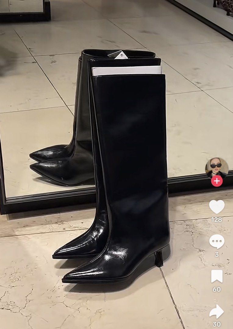 Zara Black Pointed Toe Kitten Heel Boots (Category: Boots) located in Makati City. Submitted by bibas.corner (Listing ID 1468167250, Image 1). Description: - Color: Black - Style: High-rise boots with slouchy shaft and curved front seam - Toe: Pointed toe - Heel: Slim stiletto kitten heel - Finish: Shiny/glossy material - Perfect for: Styling with skirts and dresses.
