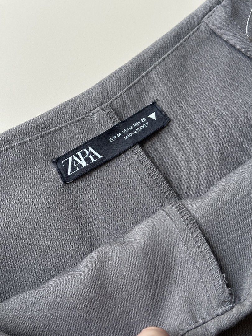 Zara grey mini skirt (Category: Skirts) located in Makati City. Submitted by popmart (Listing ID 1468077139, Image 3). Description: Stone Grey Size EU M / US M / MEX 28 With built-in shorts Best fits S-M With barcode and inditex tags for authenticity (pics).