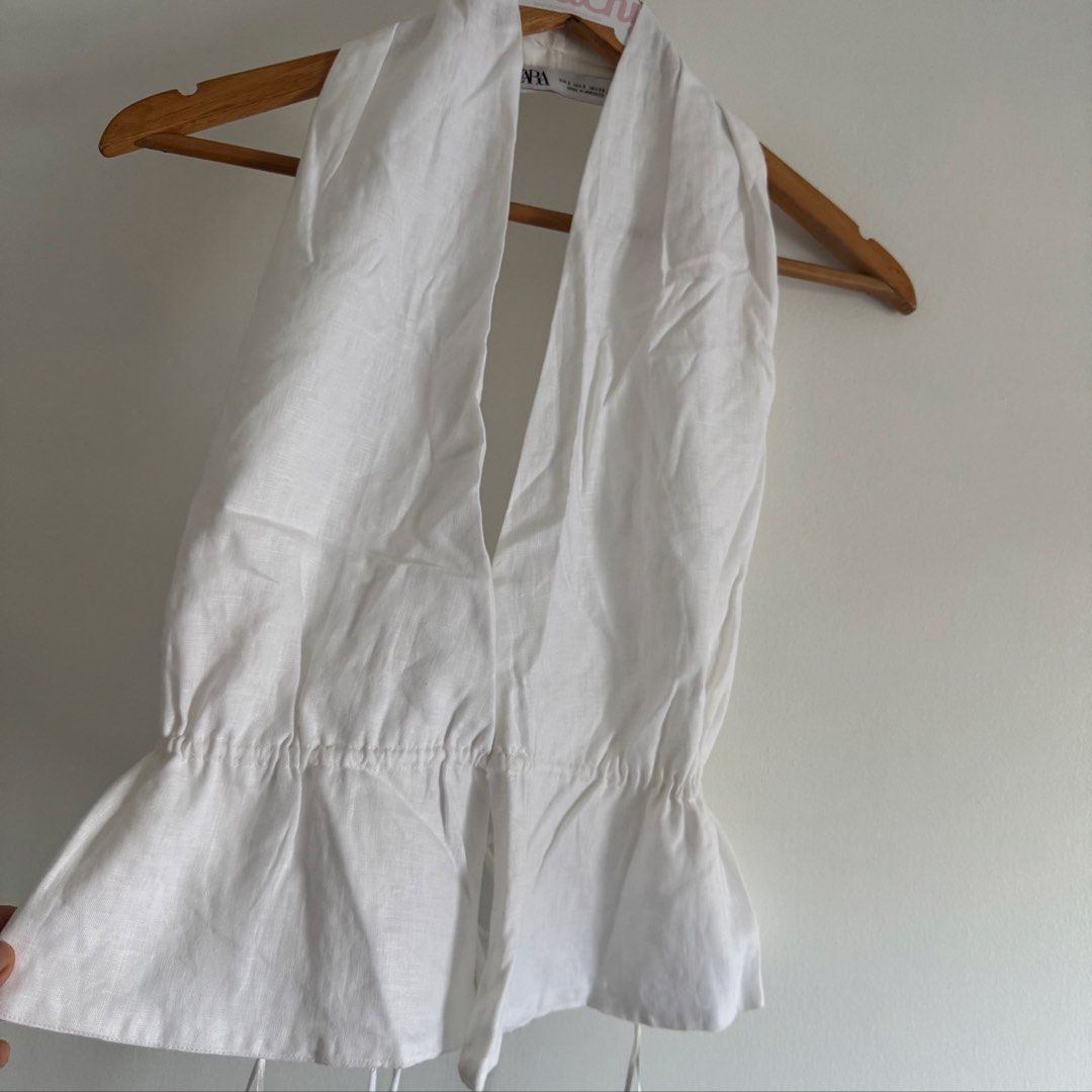Zara linen Halter (Category: Sleeveless) located in Manila. Submitted by apparella.ph (Listing ID 1468059774, Image 2). Description: 10/10 removed tag only Super pretty 100% linen Got in europe pa Open back sya so pwd sa bust 36 and up 46 Fits s-xl since open back / adjustable strap and natatali sa likod.
