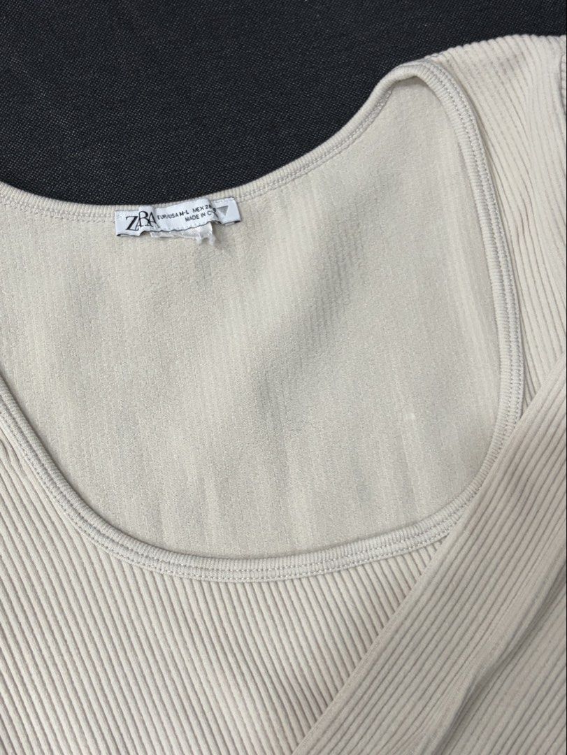 Zara Ribbed Long Sleeve Top (Category: Longsleeves) located in Manila. Submitted by cpaa.aaa (Listing ID 1468131069, Image 3). Description: Zara Cream Size: S-M Stretchy ribbed knit fabric Scoop neckline cropped top.