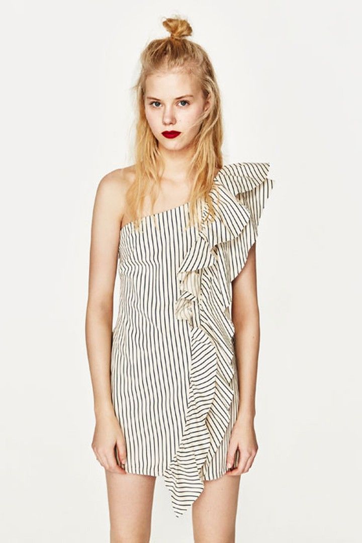 Zara Striped One-Shoulder Ruffle Dress (Category: Dresses) located in Las Pinas. Submitted by sandrapee (Listing ID 1468097128, Image 2). Description: Zara Asymmetric Denim Dress with Ruffles Trafaluc Denim One-shoulder Dress with Ruffles Size: Small Color: Striped Ivory Blue Material: 100% Cotton Like New Never used With very few and small yellow stains RFS: Size and decluttering.