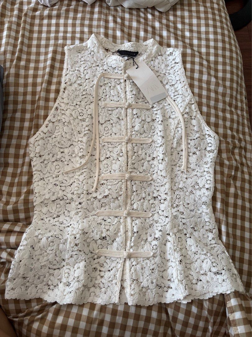 Zara White Full Lace Mandarin Collar Top (Category: Blouses) located in Marikina City. Submitted by koletteyy (Listing ID 1468092032, Image 1). Description: - Brand: Zara - Style: Sleeveless top with mandarin collar and Chinese knot frog buttons - Material/Design: Beautiful floral lace pattern throughout - Size: Medium - Condition: Brand new with original store tag attached, just tried on bust is 35-36 waist 28 NO LOWBALLER! NEW SA STORE TOH!.