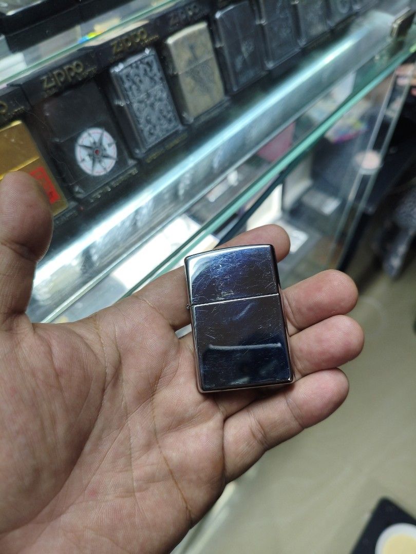 Zippo High Polished Chrome (Category: Vintage Collectibles) located in Paranaque City. Submitted by Sensation (Listing ID 1468234871, Image 1). Description: Used, no box. Free refill of Zippo fluid if booked via lalamove..