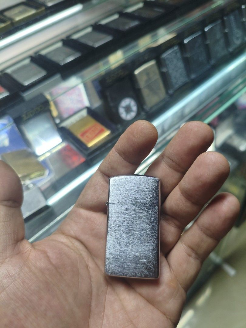 Zippo Slim Lighter (Category: Vintage Collectibles) located in Paranaque City. Submitted by Sensation (Listing ID 1468070630, Image 1). Description: Used working condition, no box. Free refill of Zippo fluid if booked via lalamove..