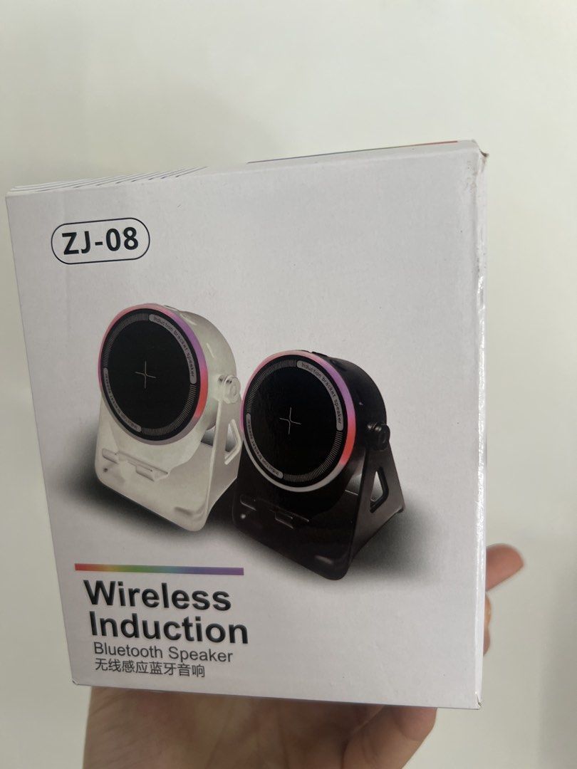 ZJ-08 Wireless Induction Bluetooth Speaker Stand (Category: Soundbars, Speakers & Amplifiers) located in Quezon City. Submitted by myclosetph (Listing ID 1468111694, Image 1). Description: - Model: ZJ-08 Wireless Induction Bluetooth Speaker - Condition: Brand new, unopened packaging - Features built-in phone stand for hands-free use - Equipped with a stylish multi-color light ring around the audio pad - Perfect desktop accessory for music and mob