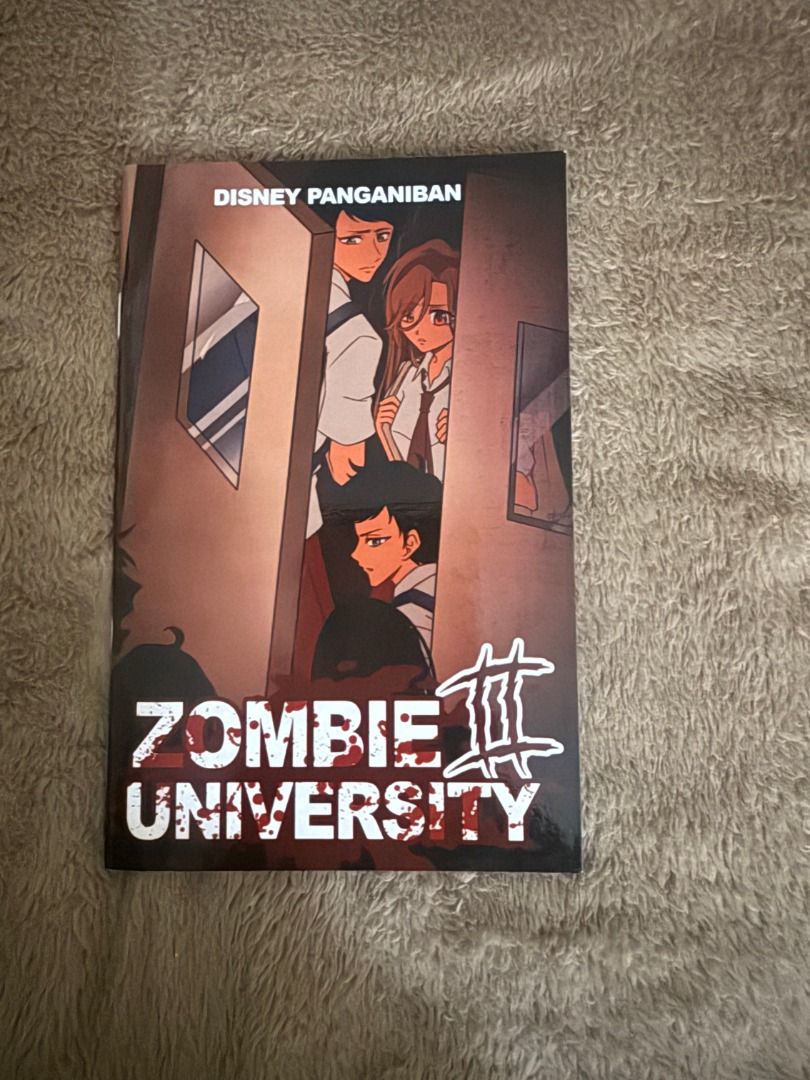 Zombie University 2 by Disney Panganiban (Category: Storybooks) located in Manila. Submitted by vaultfinds (Listing ID 1468263621, Image 1). Description: Zombie University 2 by Disney Panganiban. Paperback horror novel with anime style character illustrations on the cover. Clean pages, flat spine, minimal shelf wear on corners. Great read for fans of zombie apocalypse stories and local graphic fiction..