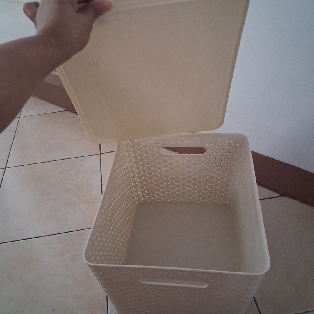 14 Pcs. Wicker Style Plastic Storage Baskets With Lids (Category: Storage Boxes & Baskets) located in Manila. Submitted by decluterring_manila (Listing ID 1468310768, Image 3). Description: Beige plastic storage boxes with woven pattern design. Built-in handles on the sides for easy carrying. Removable lids included. Stackable units help keep closets and shelves tidy. Durable material works great for organizing clothes, toys, or daily clutter. Qu
