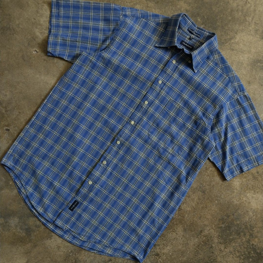 1990s Gant Blue Checkered Chambray Button-down Shirt (Category: Formal Shirts) located in Bulacan. Submitted by hustleoverluckphv2 (Listing ID 1468341852, Image 2). Description: 1990s Gant Blue Checkered Chambray Button-down Shirt XL on tag Measurements Width - 23" Length - 32" Php 490.