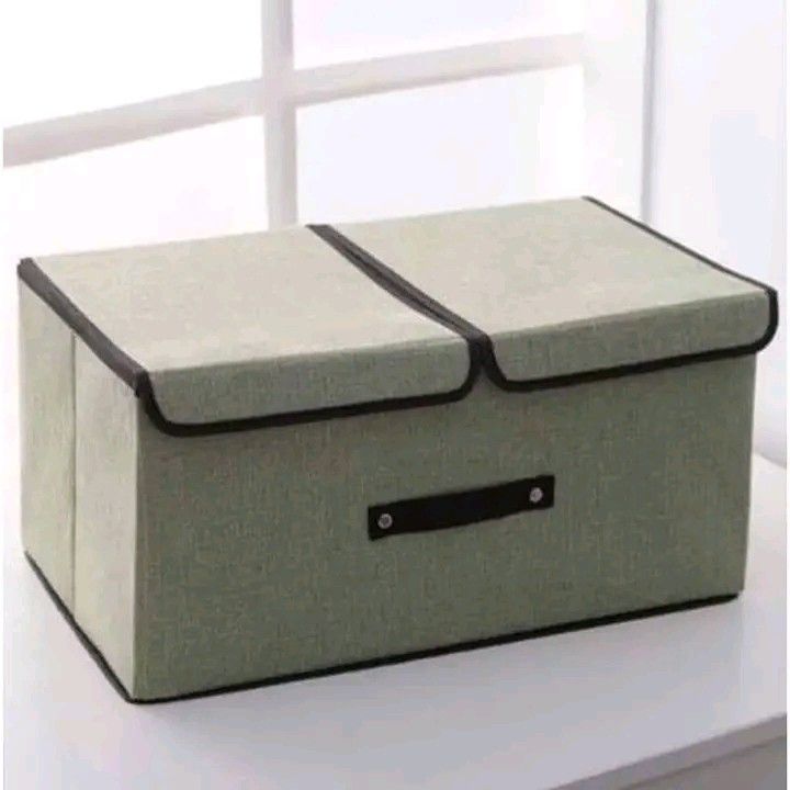 2grid storage box finishing box fabric folding double cover large storage box (Category: Storage Boxes & Baskets) located in Manila. Submitted by berdenmarl01688 (Listing ID 1468482610, Image 2). Description: - Versatile fabric storage box for clothes, toys, and room clutter - Convenient double flip lids for easy access - Sturdy front handle for effortless pulling and carrying - Foldable design to save space when not in use - Chic linen-look fabr