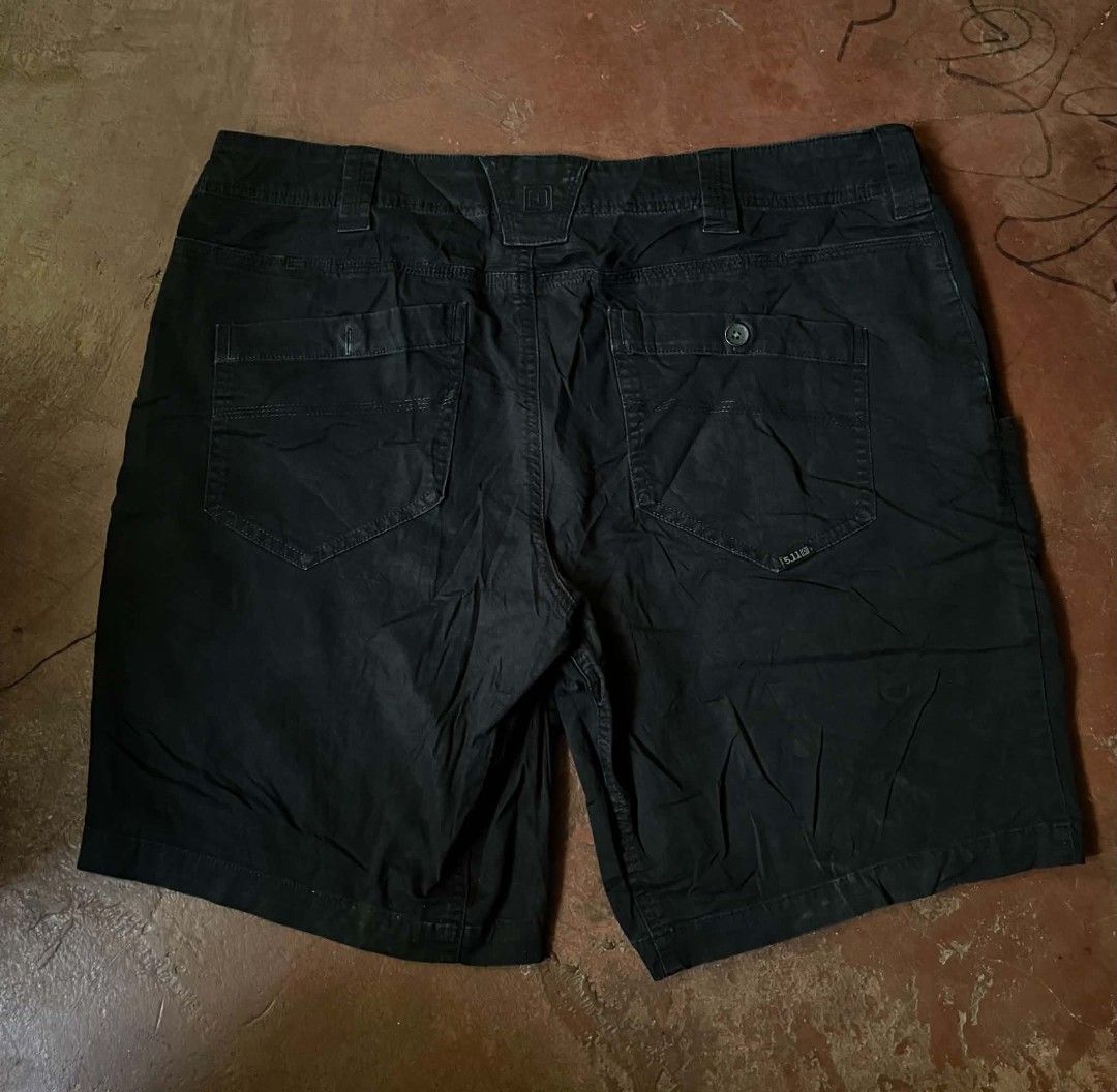 5.11 Tactical Black shorts Size 34 (Category: Shorts) located in Gumaca. Submitted by makuliti (Listing ID 1468307631, Image 2). Description: - Brand: 5.11 Tactical - Color: Black - Size: 34 - Origin: Made in Vietnam - Features: Multiple front and back utility pockets, button closure with sturdy belt loops - Material: Heavy-duty durable fabric ideal for outdoor and work use - Condition: Excellent.