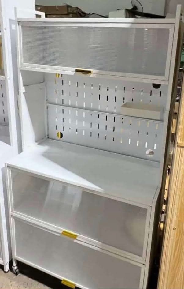5-Layer White Kitchen Storage Cabinet with PC Doors 80cm (Category: Shelves, Cabinets & Racks) located in Manila. Submitted by ajimdolor012051 (Listing ID 1468335782, Image 1). Description: - Sleek white 5-layer storage cabinet for kitchens, coffee stations, or pantries - Dimensions: 80cm (W) x 39cm (D) x 155cm (H) - Heavy-duty build with thickened 25mm laminate shelves for maximum stability - Stylish sunshine PC doors and practical DIY pegboard 