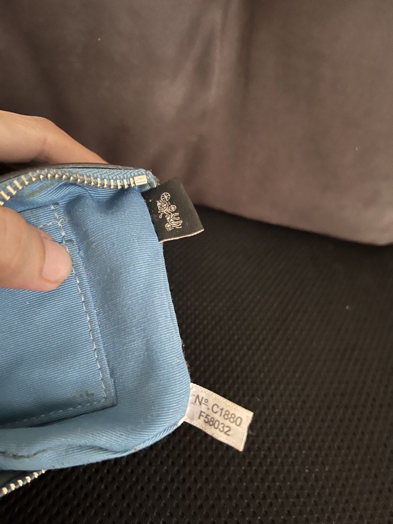 🇺🇸 Authentic Coach Blue Leather Wristlet (Category: Luxury Bags & Wallets) located in Manila. Submitted by prelovedpick.com (Listing ID 1468313853, Image 2). Description: Decluttering ‼️ With freebies - Brand: Coach - Material: Crossgrain leather in bright blue - Hardware: Silver-tone with secure zip closure - Features: Attached matching wrist strap, interior fabric lining with a slip pocket - Authenticity: Interior creed tag with serial number