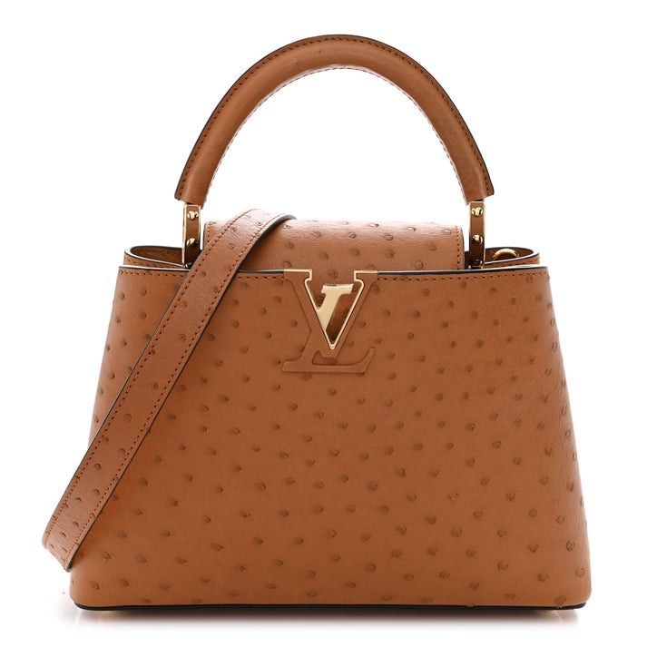 🖤 Louis Vuitton Ostrich Capucines BB Cognac (Category: Luxury Accessories) located in Caloocan City. Submitted by mohsin2 (Listing ID 1468309745, Image 1). Description: Louis Vuitton Ostrich Capucines BB Cognac 13,980p plus sf Genuine Ostrich leather Like new/Brandnew By Nicolas Ghesquière Brown Ostrich Brass Hardware Rolled Handle & Single Adjustable Shoulder Strap Leather Lining & Single Interior Pocket Fold-In Flap Closure at Top Protective F