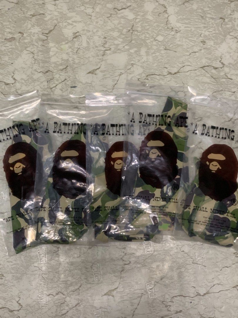 A Bathing Ape Bape Camo Durag (Category: Jeans) located in Manila. Submitted by grandfire-d26d (Listing ID 1468425577, Image 2). Description: - Brand: A Bathing Ape (BAPE) - Item: Green Camo Print Durag - Details: Iconic Ape head logo graphic on side ties - Fit: Long straps for easy styling and adjustable fit - Condition: Brand new, comes sealed in original branded zip-lock bag - Availability: Multiple pieces available.