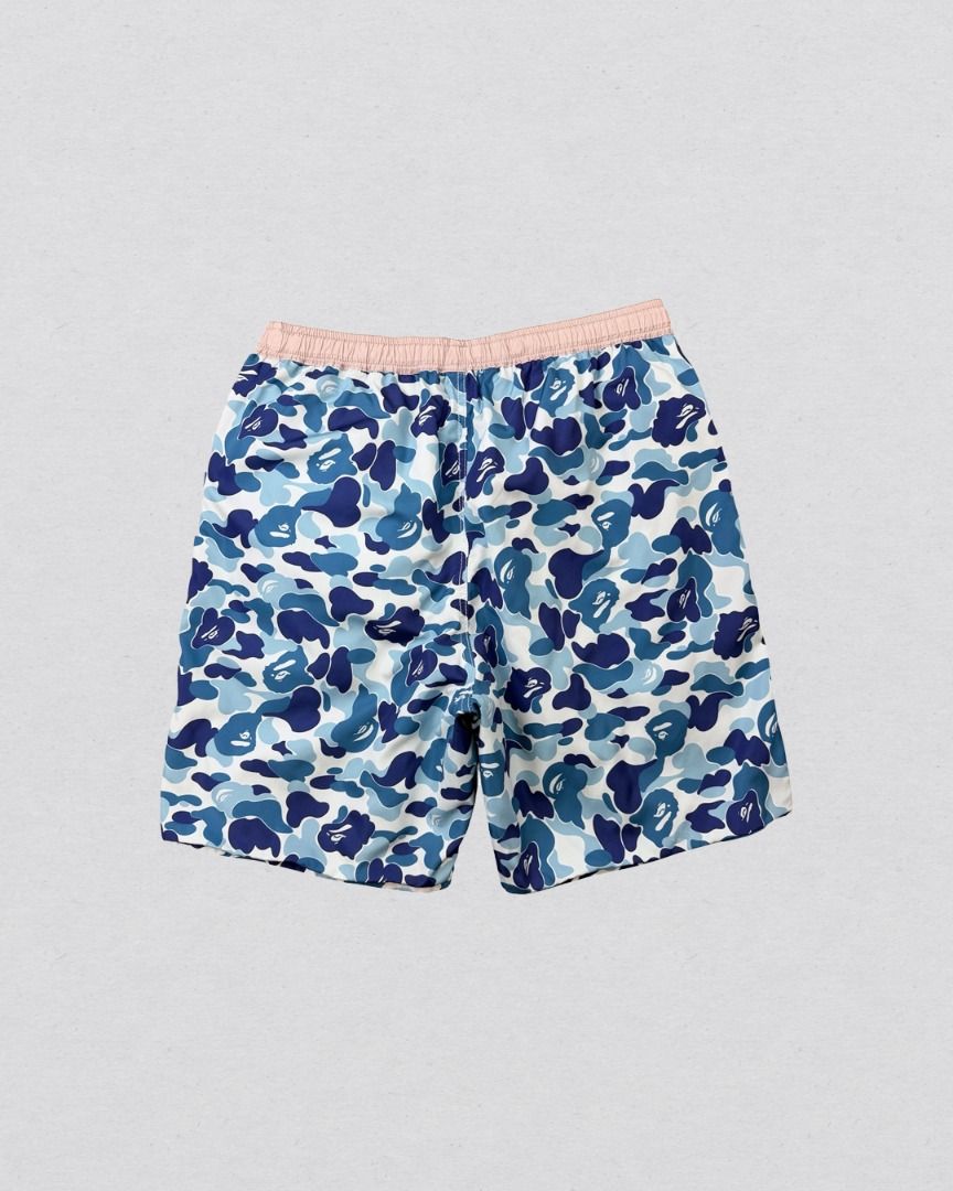 A Bathing Ape Blue Camou Reversible Nylon shorts (Category: Shorts) located in Cabanatuan. Submitted by argarments.ph (Listing ID 1468377726, Image 3). Description: Tagged: Medium on tag Waist 28-32" | Length 18.5" | Leg opening 10.5" | Thigh 11.5" | Rise 14" Condition: Great condition Issue(s): Small dirt stain and small scratch. see photos.