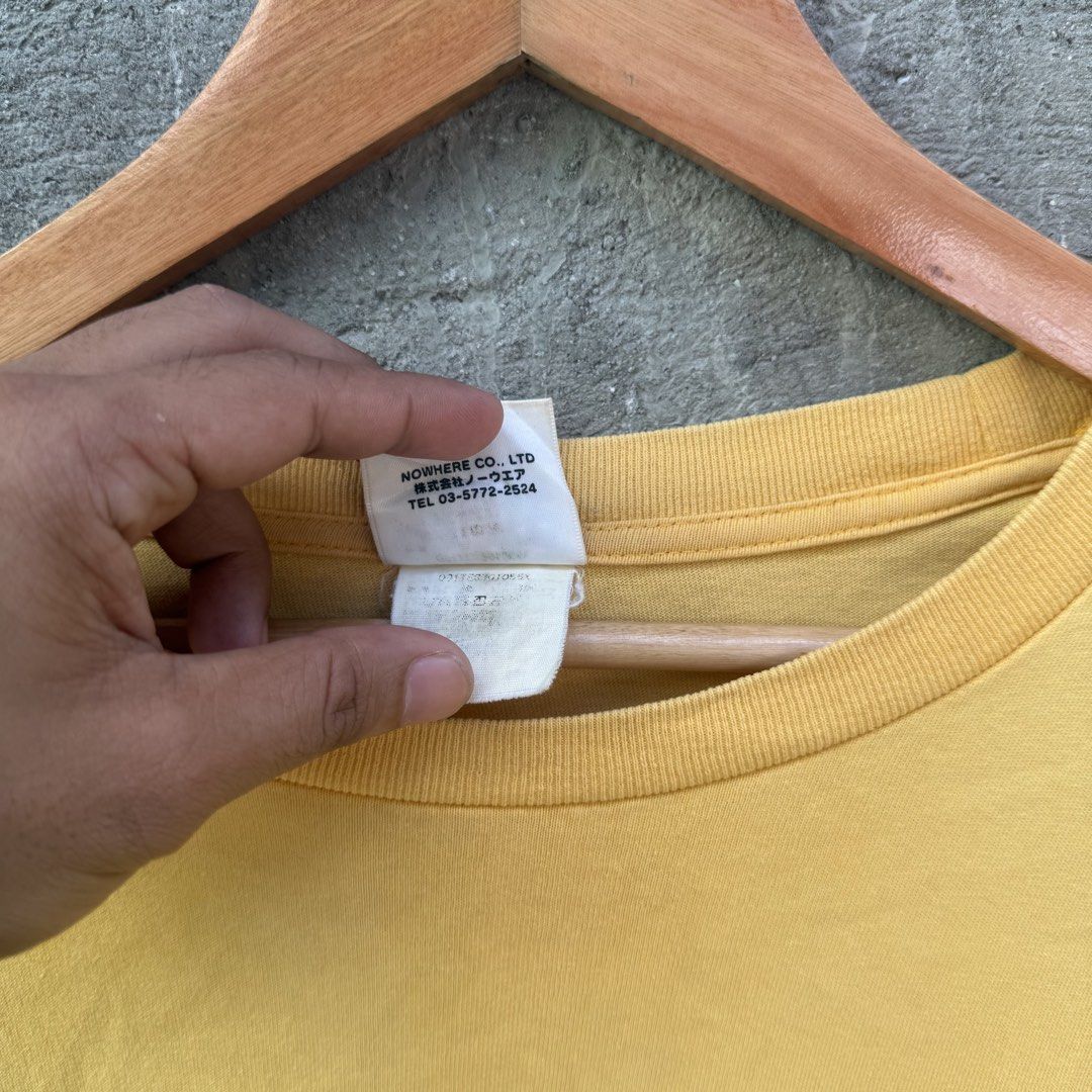 A Bathing Ape Shark Yellow Tee XL (Category: Tshirts & Polo Shirts ) located in Caloocan City. Submitted by ayogorenia1002 (Listing ID 1468350615, Image 3). Description: - Brand: A Bathing Ape (BAPE) - Color: Bright Yellow - Size: Men's XL - Design: Colorful shark jaw and eye graphics near bottom sides - Details: Signature ape head patch on sleeve, classic collar tags intact - Condition: Solid streetwear piece, well-maintained - Shipping or meet-