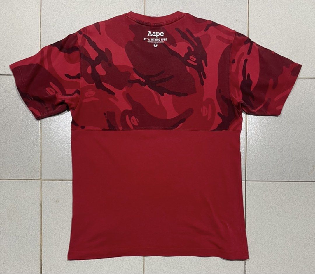 Aape Tshirt (Category: Tshirts & Polo Shirts ) located in Mandaue City. Submitted by MJ_80 (Listing ID 1468367124, Image 2). Description: Aape Tshirt Medium Dimes: 20 X 27.5 See photos for measurements Issue: see last 3 photos, hairline crack on pint, fade sleeve tape & light stain at the back. Color rate & Condition: 9.7/10 Price: 1,000 .