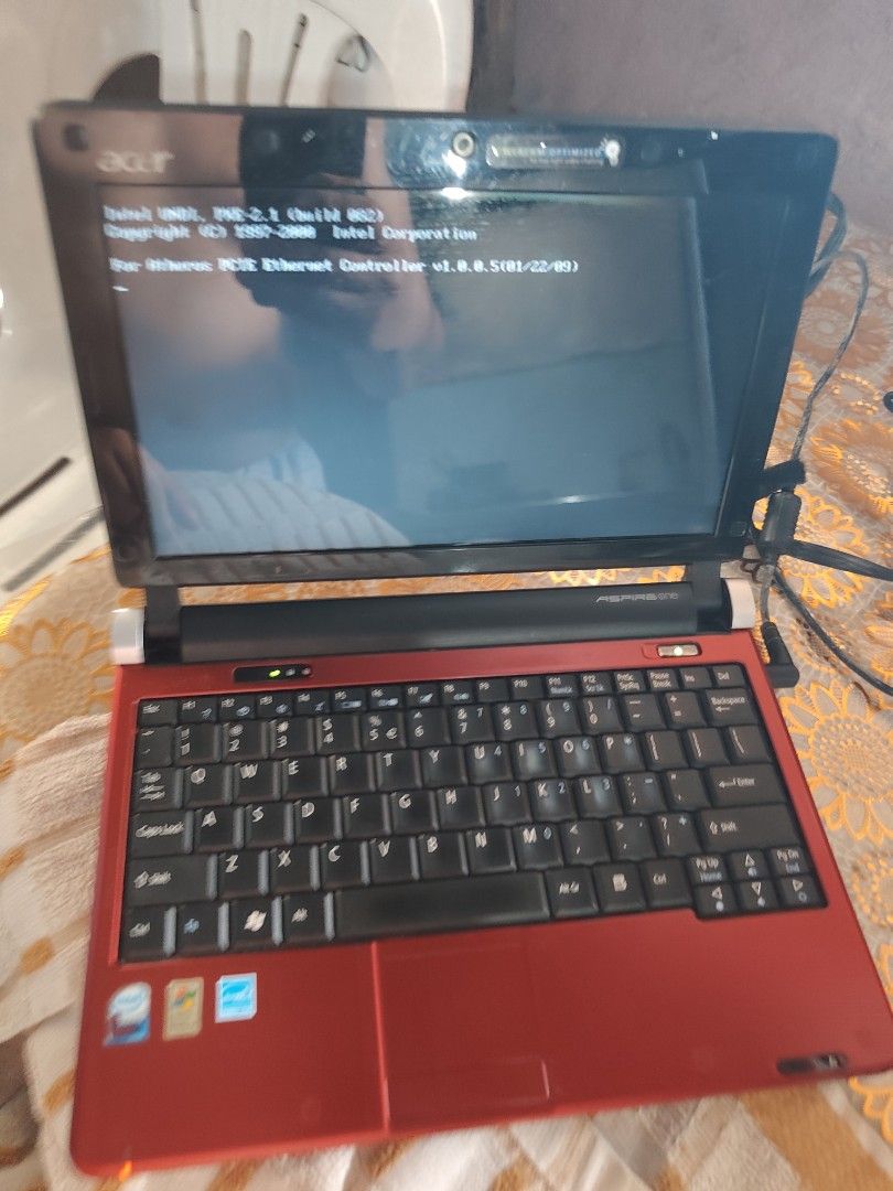 Acer Aspire One Netbook Red (Category: Laptops & Notebooks) located in Muntinlupa City. Submitted by dhido (Listing ID 1468300838, Image 1). Description: - Model: Acer Aspire One Netbook - Color: Eye-catching shiny red with silver branding - Features: Compact design, built-in webcam, QWERTY keyboard, and trackpad - Included: Original power adapter cable - Condition note: Boots up to network boot screen currently - Best for: Basic tasks, light use