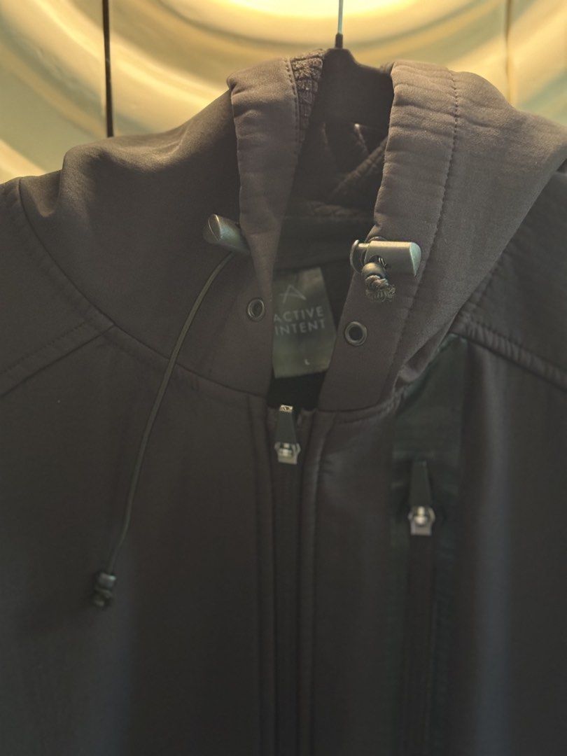 Active Intent Black Hooded Softshell Jacket Size S and L (Category: Coats, Jackets and Outerwear) located in Angeles City. Submitted by adeclutters__ (Listing ID 1468339016, Image 2). Description: - Set of 2 Active Intent black softshell jackets (Sizes: Small and Large) - Cozy fleece lining for extra warmth during chilly days - Zip-up front design with adjustable hood drawstrings - Secure zipped chest pockets for your essentials - Versatile outer