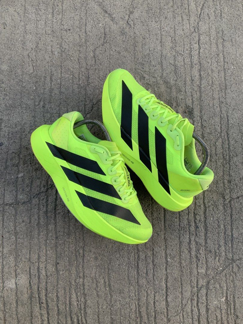 Adidas Adizero Evo Sl (Category: Sneakers) located in Cavite. Submitted by thriftkicks3 (Listing ID 1468368177, Image 1). Description: - Brand: Adidas Adizero Evo SL - Color: Neon yellowgreen with black stripes - Us 8.5 , Euro 42 , Cm 26.5 - Cushioning: Lightstrike Pro midsole - Upper: Lightweight and breathable mesh - Use: Ideal for daily training and speed work - Sole: Traction rubber outsole .