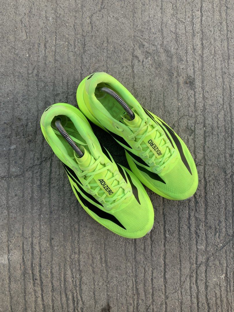 Adidas Adizero Evo Sl (Category: Sneakers) located in Cavite. Submitted by thriftkicks3 (Listing ID 1468368177, Image 3). Description: - Brand: Adidas Adizero Evo SL - Color: Neon yellowgreen with black stripes - Us 8.5 , Euro 42 , Cm 26.5 - Cushioning: Lightstrike Pro midsole - Upper: Lightweight and breathable mesh - Use: Ideal for daily training and speed work - Sole: Traction rubber outsole .
