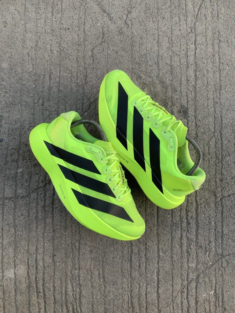 Adidas Adizero Evo Sl (Category: Sneakers) located in Cavite. Submitted by thriftkicks3 (Listing ID 1468368177, Image 2). Description: - Brand: Adidas Adizero Evo SL - Color: Neon yellowgreen with black stripes - Us 8.5 , Euro 42 , Cm 26.5 - Cushioning: Lightstrike Pro midsole - Upper: Lightweight and breathable mesh - Use: Ideal for daily training and speed work - Sole: Traction rubber outsole .