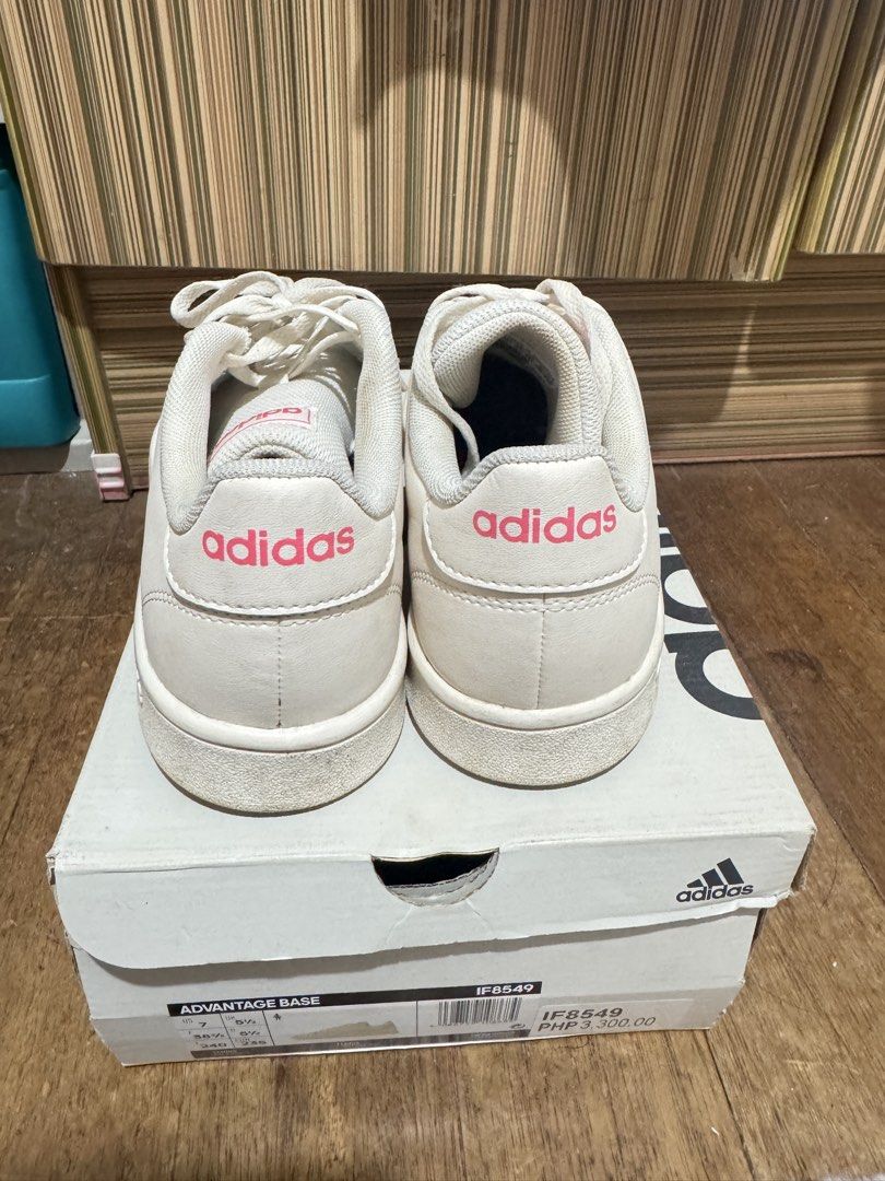Adidas Advantage Base White Pink Sneakers US 7 (Category: Sneakers) located in Manila. Submitted by chie04_875 (Listing ID 1468457731, Image 3). Description: - Brand: Adidas - Model: Advantage Base (IF8549) - Color: White with pink logo details - Condition: Clean upper with minimal crease on the toe box - Features: Lace-up closure, iconic perforated 3-stripes - Inclusion: Original shoebox with model and size label included.