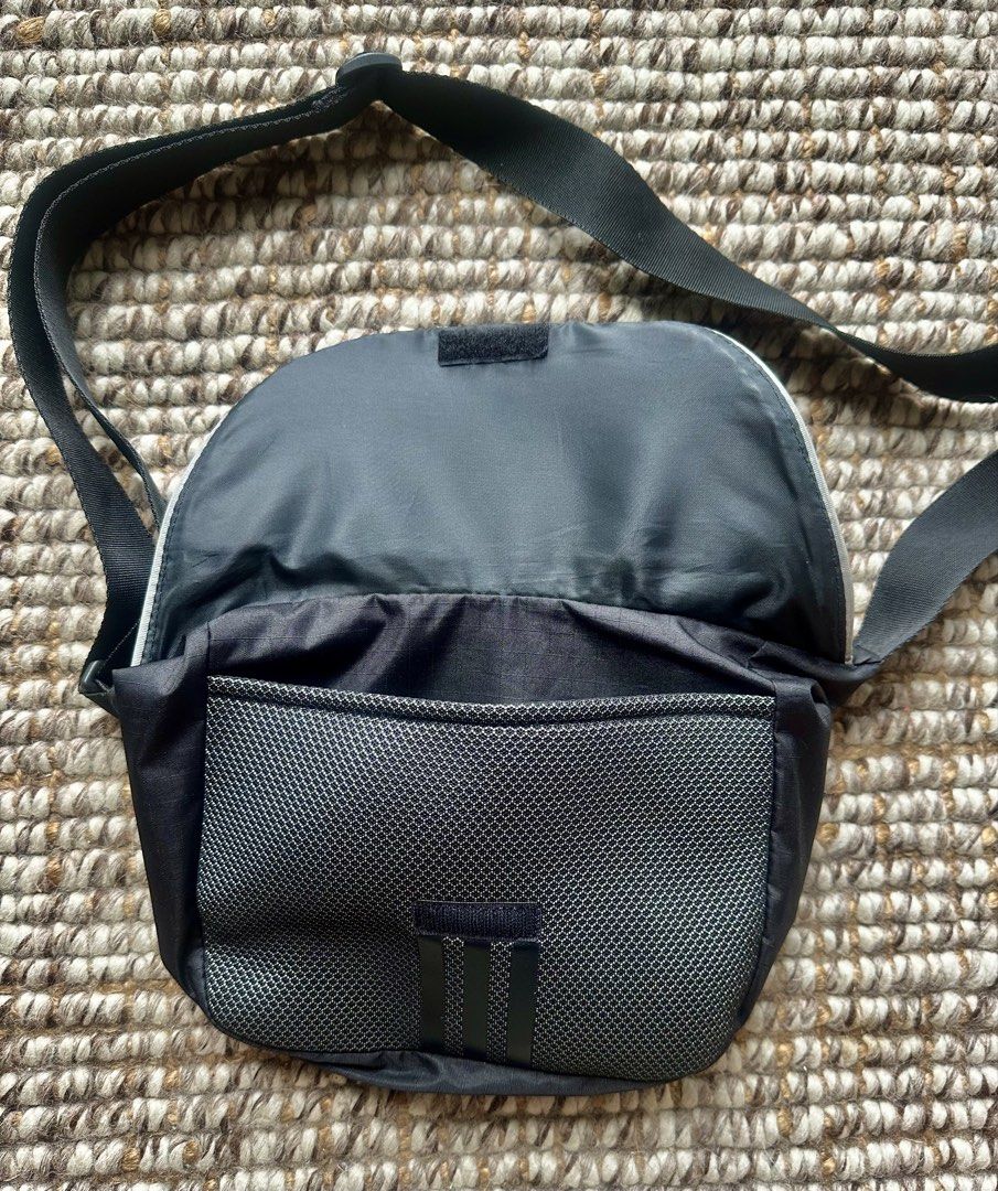 Adidas Black Shoulder Bag (Category: Sling Bags) located in Makati City. Submitted by jerbinator11 (Listing ID 1468289154, Image 3). Description: Dimensions: 5 cm x 32 cm x 24.5 cm Volume: 5.75 L 100% authentic with receipt. Perfect for daily use and for travel. Pm for more details. Makati located .