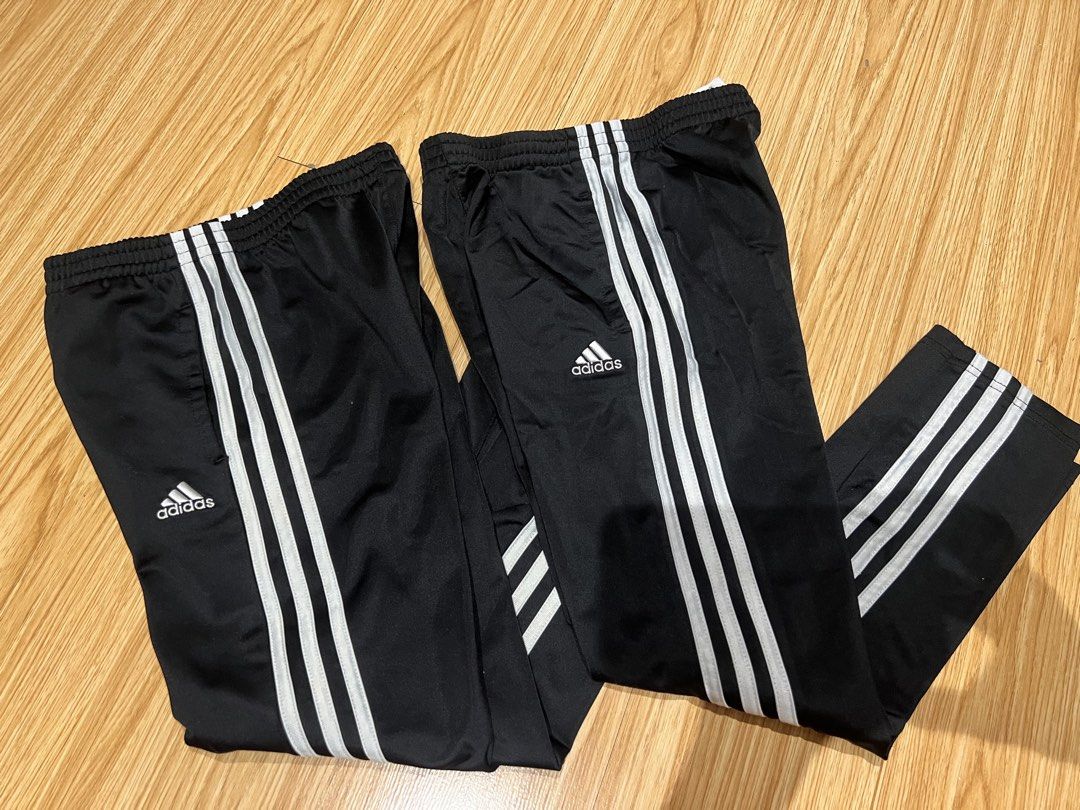 Adidas Black White Stripe Track Pants Size 7 (Category: Babies & Kids Fashion) located in Taguig. Submitted by fifileen (Listing ID 1468380967, Image 2). Description: - Brand: Adidas - Color: Classic black with white side stripes - Material: 100% lightweight polyester - Features: Elastic waistband and embroidered white Adidas logo on left leg - Size: Size 7 -authentic bought from US ₱600 each.