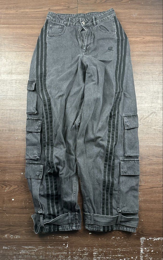 Adidas Denim Cargo Pants Washed Black Size 28 (Category: Jeans) located in Manila. Submitted by kupal24 (Listing ID 1468376728, Image 1). Description: - Brand: Adidas - Item: Washed Black Denim Cargo Pants - Size: 28 US - Style Code: IV9345 - Fit: Relaxed fit with durable denim material - Details: Signature three stripes, multiple utility cargo pockets, adjustable hem straps - Branding: Embroidered trefoil logo on hip and Adidas paper patch on ba