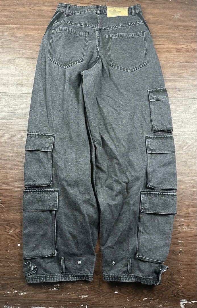 Adidas Denim Cargo Pants Washed Black Size 28 (Category: Jeans) located in Manila. Submitted by kupal24 (Listing ID 1468376728, Image 3). Description: - Brand: Adidas - Item: Washed Black Denim Cargo Pants - Size: 28 US - Style Code: IV9345 - Fit: Relaxed fit with durable denim material - Details: Signature three stripes, multiple utility cargo pockets, adjustable hem straps - Branding: Embroidered trefoil logo on hip and Adidas paper patch on ba