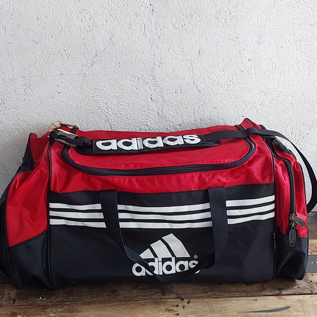Adidas Duffle Bag Red Black (Category: Sling Bags) located in Caloocan City. Submitted by 2ndhand.manila (Listing ID 1468292086, Image 1). Description: Sira ang zipper sa shoe compartment. Hindi nagsasara. Swipe left for more photos and measurements. ▪️NO COD/COP ▪️Ship thru J&T ▪️Lalamove/Grab Express ▪️G-Cash or Bank Transfer ▪️Location: North Caloocan.