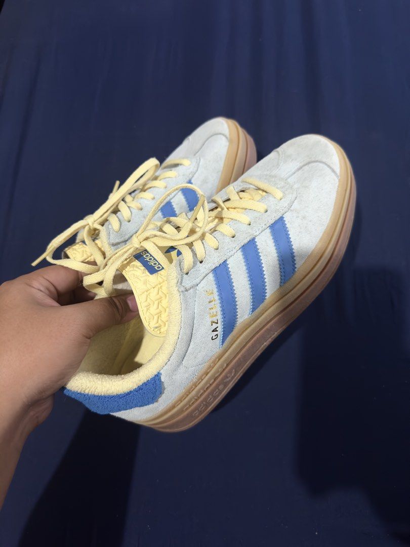 Adidas Gazelle Bold W Cloud White Clear Sky (Category: Sneakers) located in Manila. Submitted by royalfox.68af7c (Listing ID 1468362945, Image 1). Description: - Brand: Adidas Gazelle Bold W (Model: IE0430) - Colorway: Light grey suede upper, bright blue stripes, and playful yellow accents on laces, inner lining, and tongue - Sole: Trendy platform gum sole with circle traction pattern - Condition: Comfortable casual trainers with normal signs of 