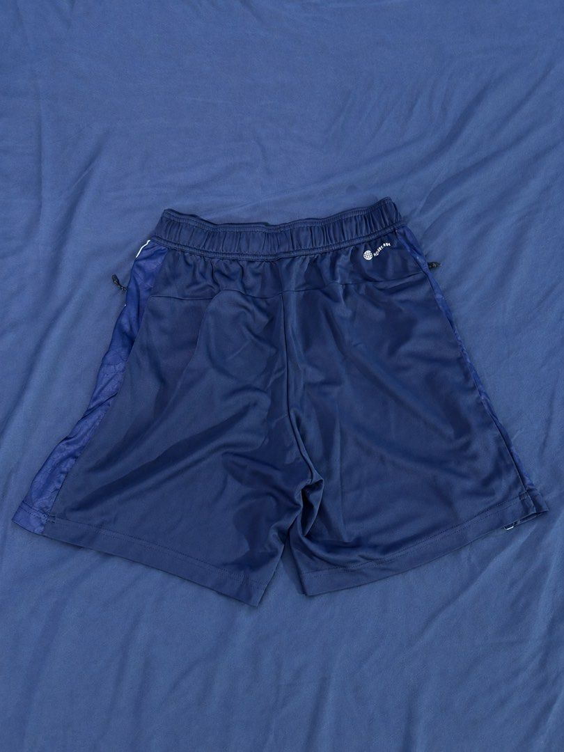 Adidas Navy Blue Athletic Shorts Size M (Category: Shorts) located in Manila. Submitted by throughhim (Listing ID 1468460229, Image 2). Description: - Brand: Adidas - Color: Navy blue with light blue side stripes - Size: US Medium (Regular fit) - Material/Tech: Aeroready technology fabric to keep you dry - Features: Secure zipper pockets, elastic waistband with drawstring - Origin: Made in Thailand - Condition: Excellent / Ready to wear.