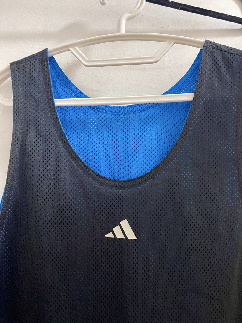 Adidas Reversible Basketball Mesh Jersey (Category: Activewear) located in Santa Rosa. Submitted by odepangilinan (Listing ID 1468350966, Image 2). Description: Size: Large Color: Reversible Black & Blue Material: Breathable Mesh Features: Centered chest Adidas logo, 2-in-1 reversible design Condition: Clean pre-owned.