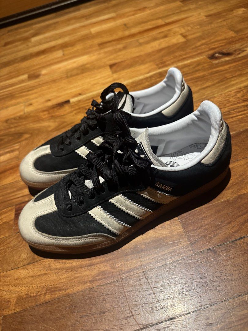 Adidas Samba Black White Sneakers (Category: Sneakers) located in Makati City. Submitted by raremixed (Listing ID 1468407648, Image 2). Description: - Brand/Model: Adidas Samba - Colorway: Classic Black & White with gum soles - Material: Textured suede front panels - Details: Gold 'SAMBA' stamp on the side, white branding on insoles, matching black laces - Style: Clean, casual everyday kicks - Condition: Pristine and ready to wear - Location: Shi